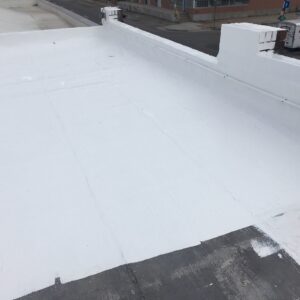 Flat roof is coated with commercial product